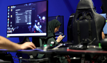 A Saudi trainee attends a training course at the Saudi Esport Academy in Riyadh on August 29, 2023. (AFP)