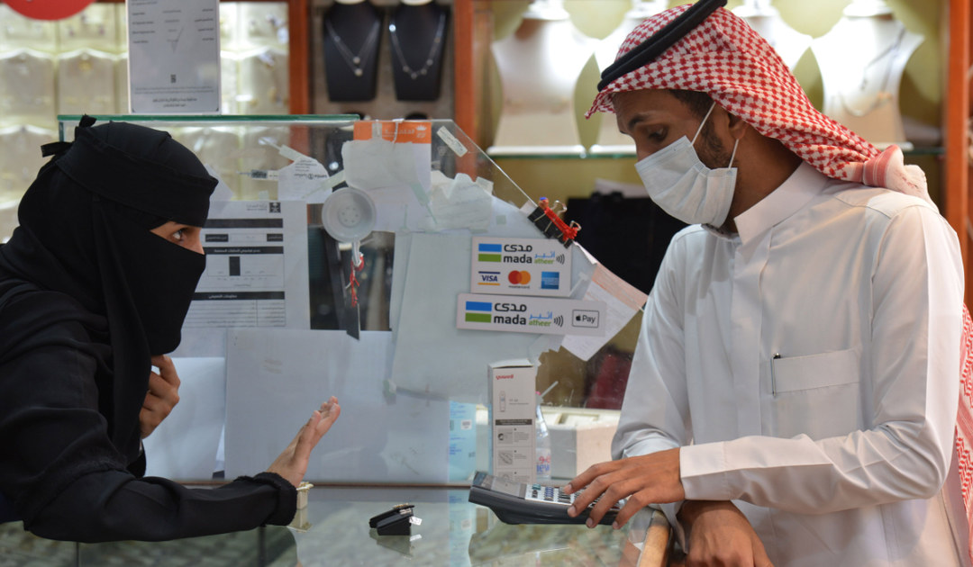 Saudis shop at a Jewellery shop in Riyadh after authorities announced a 10% increase in the VAT rate to reach 15%. (AFP)