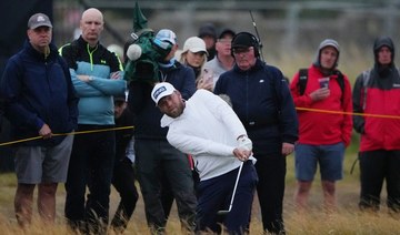 England’s Brown birdies last to lead The Open