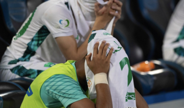 Al-Ahli players cry after their club was relegated to the first division (Yelo League) in 2022. (SPA)